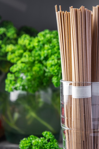 raw buckwheat noodles soba Asian snack healthy meal food snack on the table copy space food