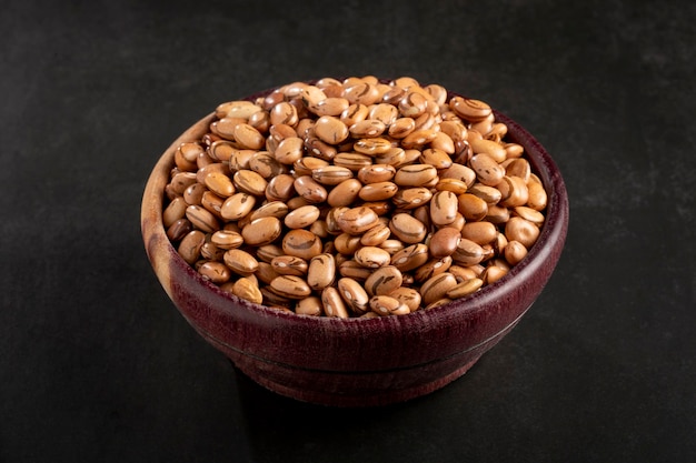 Raw carioca beans on the table