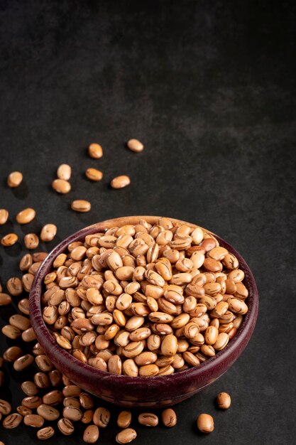 Raw carioca beans on the table