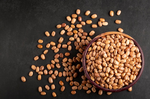 Raw carioca beans on the table