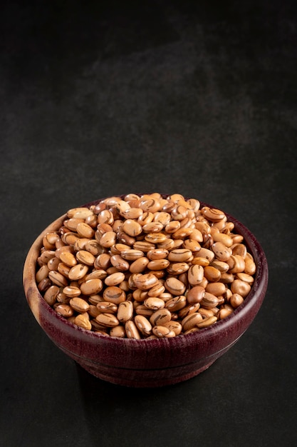 Raw carioca beans on the table