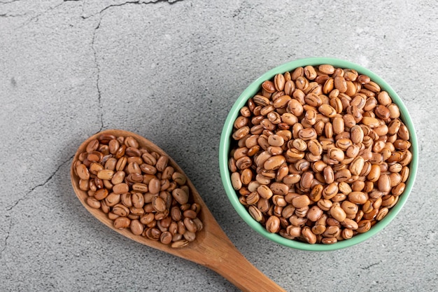 Raw carioca beans on the table