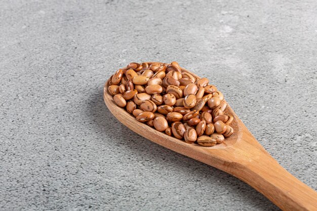 Raw carioca beans on the table