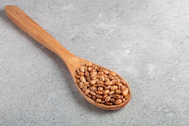 Raw carioca beans on the table