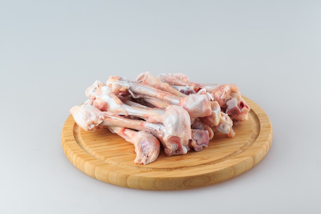  raw chicken bones on white