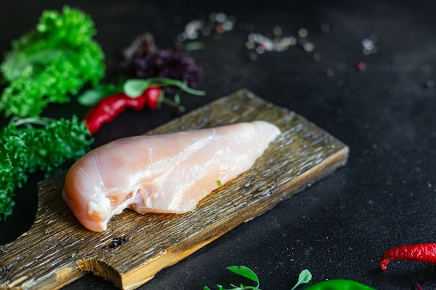 raw chicken breast meat on the table