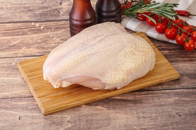 Raw chicken breast with bone