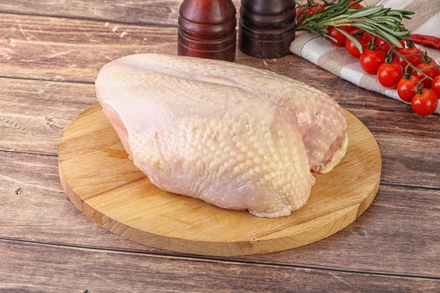 Raw chicken breast with bone