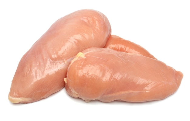 Raw chicken fillet isolated on a white background Perfectly retouched full depth of field on the photo Top view flat lay