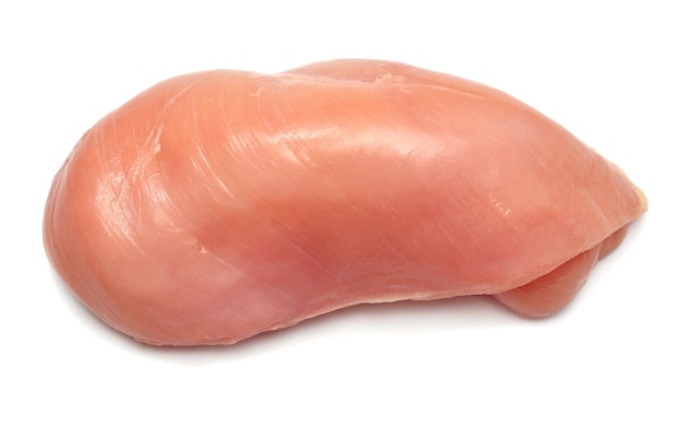 Raw chicken fillet isolated on a white background Perfectly retouched full depth of field on the photo Top view flat lay