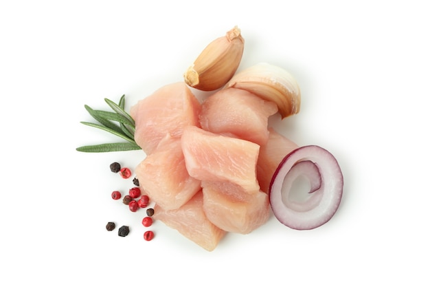 Raw chicken fillet slices isolated on white background