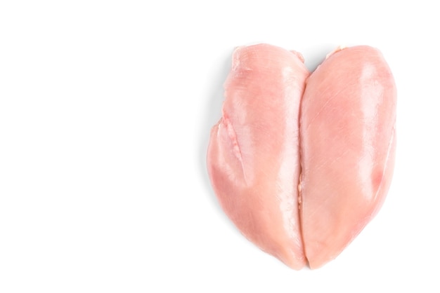 Photo raw chicken fillets isolated on white surface.
