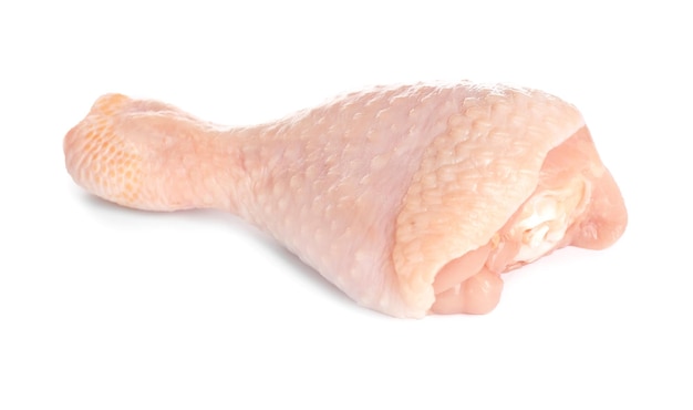 Raw chicken leg on white background