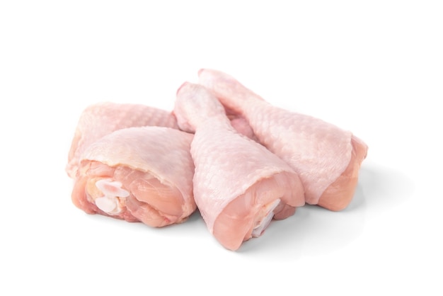 Raw chicken legs isolated on white