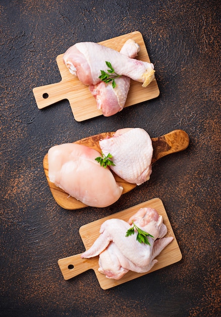 Raw chicken meat fillet, thigh, wings and legs