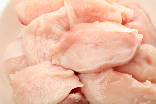 Raw chicken meat on whole space, close up