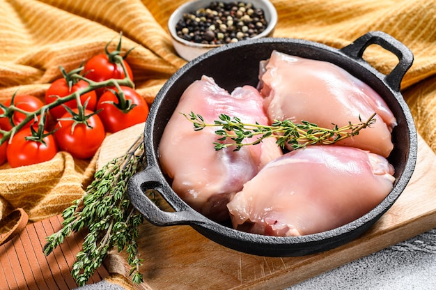 Raw chicken thigh fillet without skin