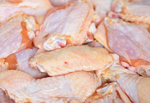 Raw chicken wings marinated