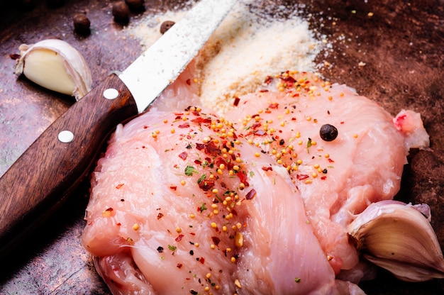 Raw chicken with spices