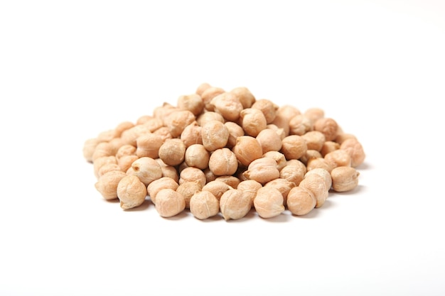 Raw chickpeas isolated on white background closeup