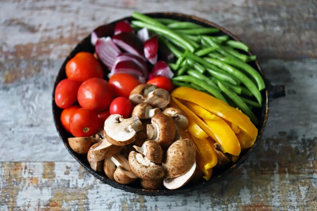 Raw colored vegetables in a pan