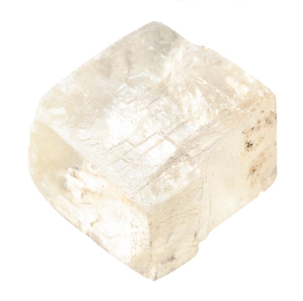 Photo raw colorless calcite mineral rhomb isolated