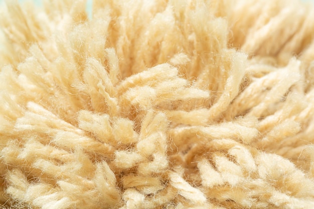 Photo raw cotton cropsyarn spinning machine macro cottonbackground from the raw cotton fiber