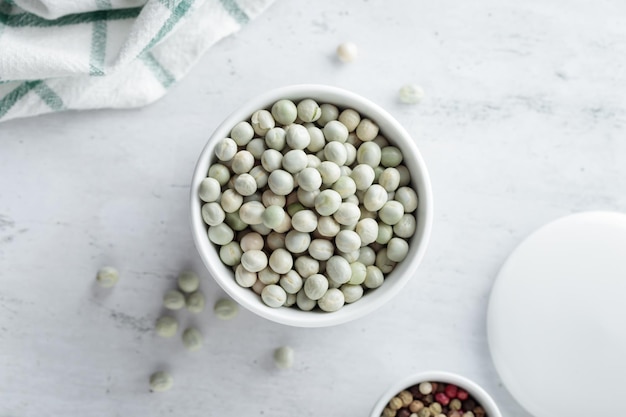 Raw Dried Green Peas in a white bowl