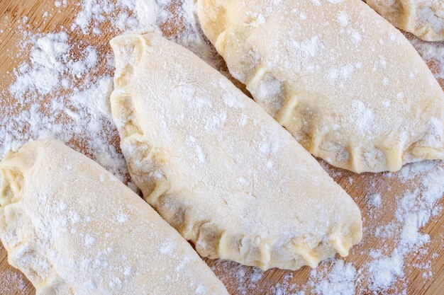 Raw dumpling with cheese