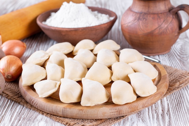 Raw dumpling with potatoes. Preparation dumplings. Varenyky, vareniki, pierogi, pyrohy