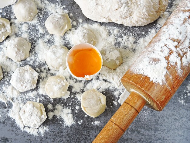 Raw dumplings being prepared