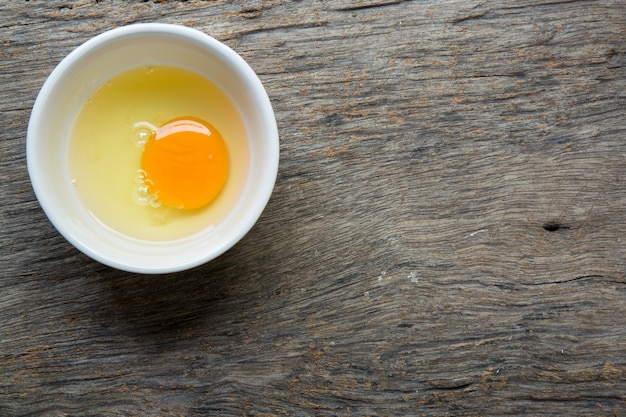 Raw egg in a bowl