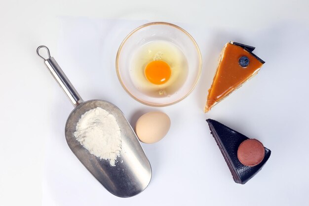 Raw Egg cake flower ingredient on white background