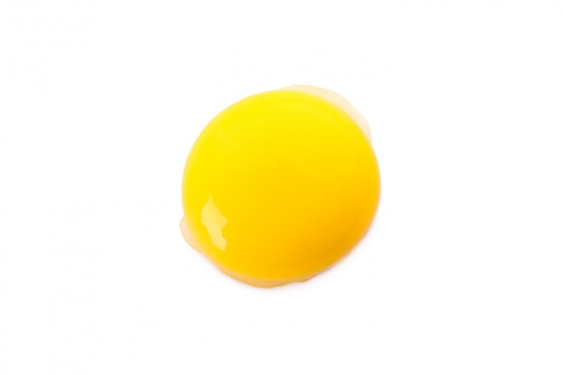 Raw egg yolk isolated on whiteRaw egg yolk isolated on white