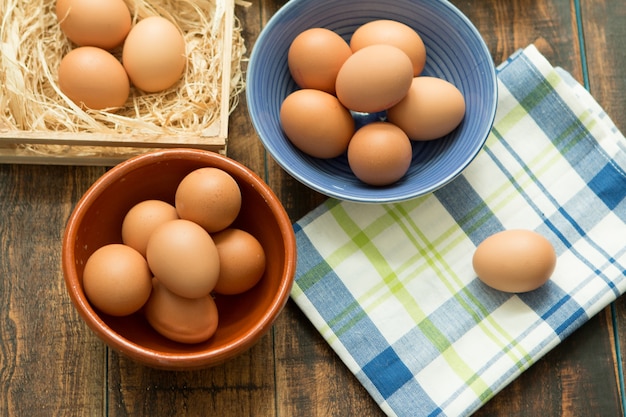 Raw eggs on a blue napkin