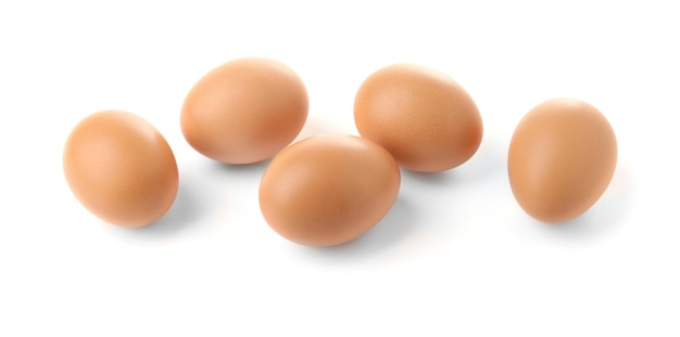 Raw eggs on white background