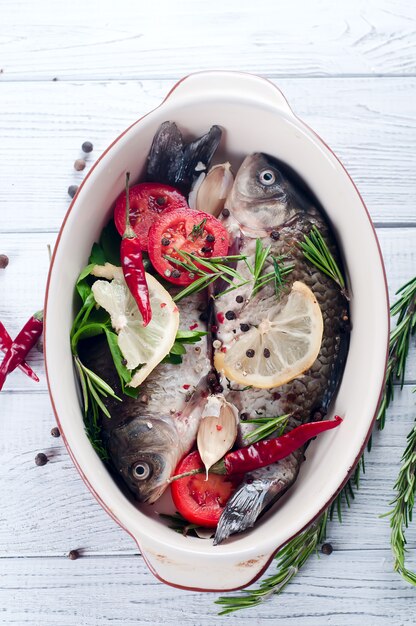 Raw fish cooking and ingredients.