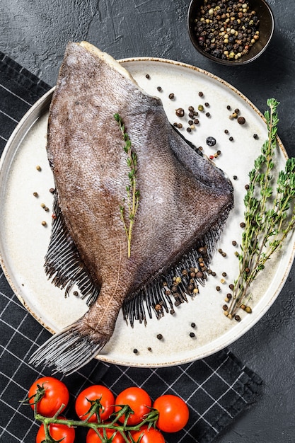 Raw fish John Dory on a plate