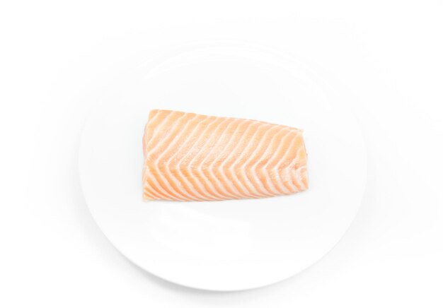 Raw fish Salmon on white dish on white background salmon steak