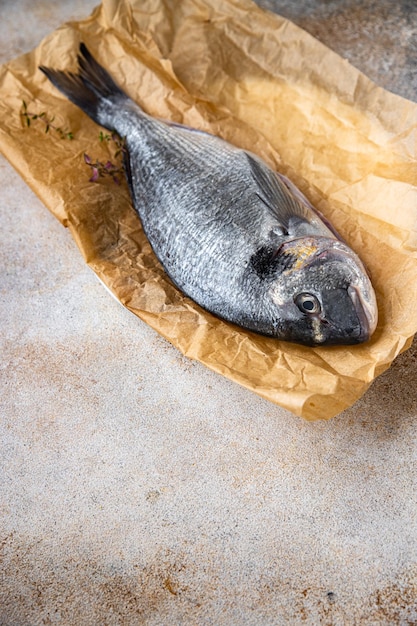 raw fish sea bream fresh seafood meal food snack on the table copy space food background rustic top