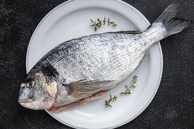 raw fish sea bream fresh seafood meal food snack on the table copy space food background rustic top