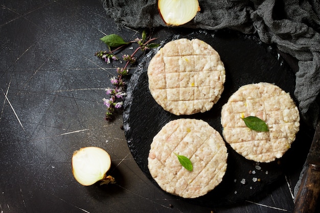 Raw fresh cutlets burger from beef for homemade burgers cooking with spices