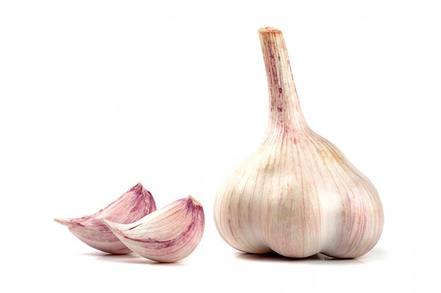 Raw fresh garlic isolated on white