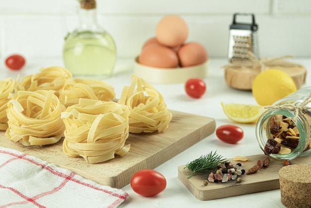 Raw and fresh homemade pasta on the table closeup