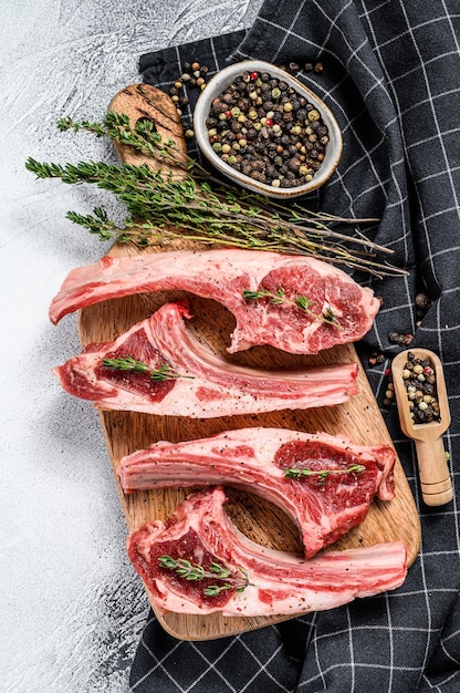 Raw fresh lamb ribs and spicy herbs