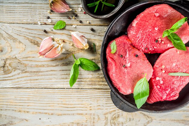 Raw fresh meat steaks with spices