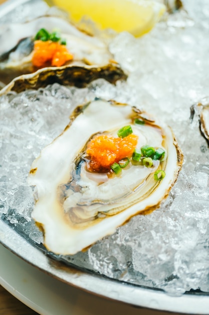 Raw and fresh oyster shell with lemon