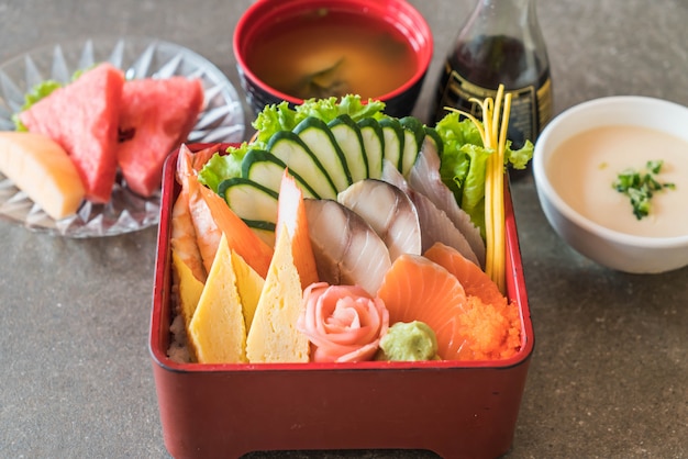 Raw fresh sashimi with rice in bento box