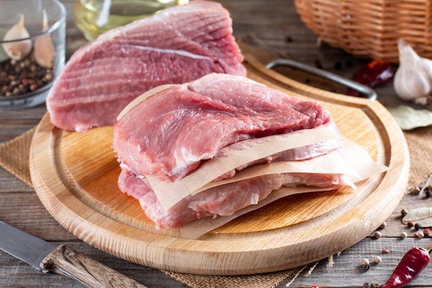 Raw frozen meat. raw pork chops - selective focus