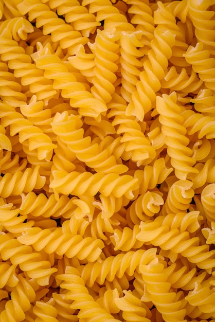 Raw fusilli pasta from whole grain wheat varieties